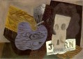 Calavera de guitarra y periódico 1913 cubismo Pablo Picasso